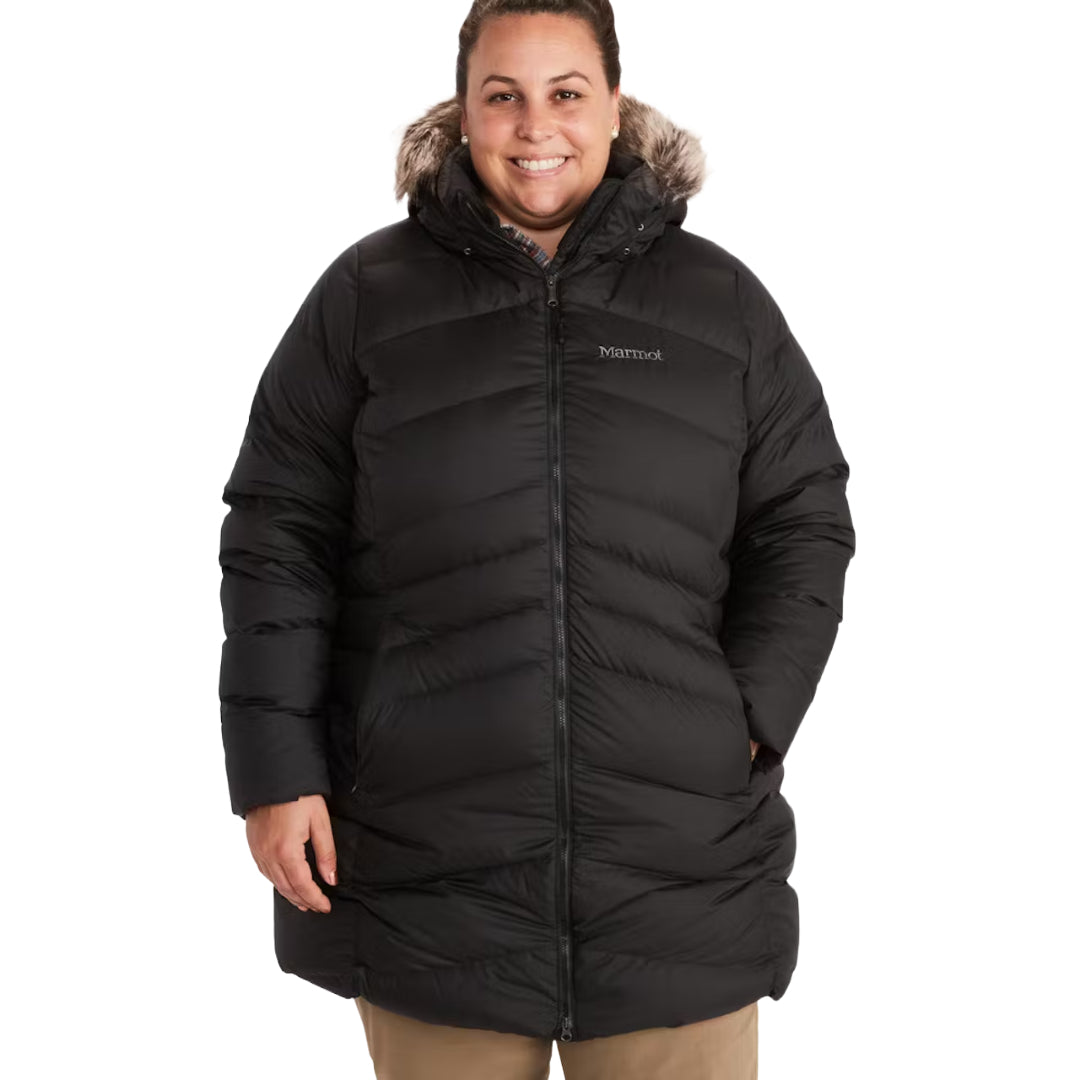 Marmot Women's Montreal Plus Size Mid-Thigh Down Puffer Coat in classic black, designed for superior warmth and comfort during cold-weather adventures.
