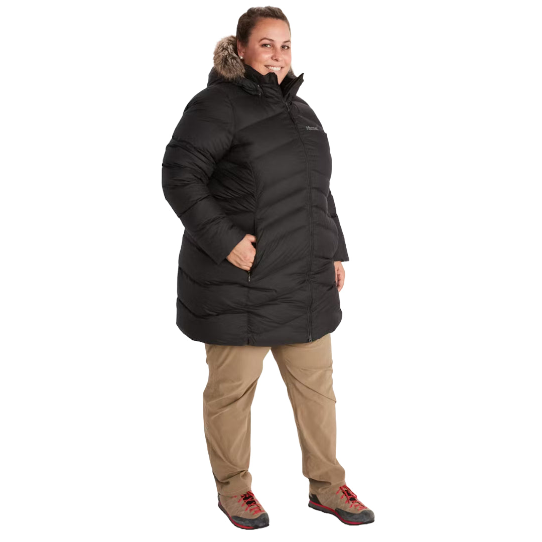 Marmot Women's Montreal Plus Size Mid-Thigh Down Puffer Coat in classic black, designed for superior warmth and comfort during cold-weather adventures.