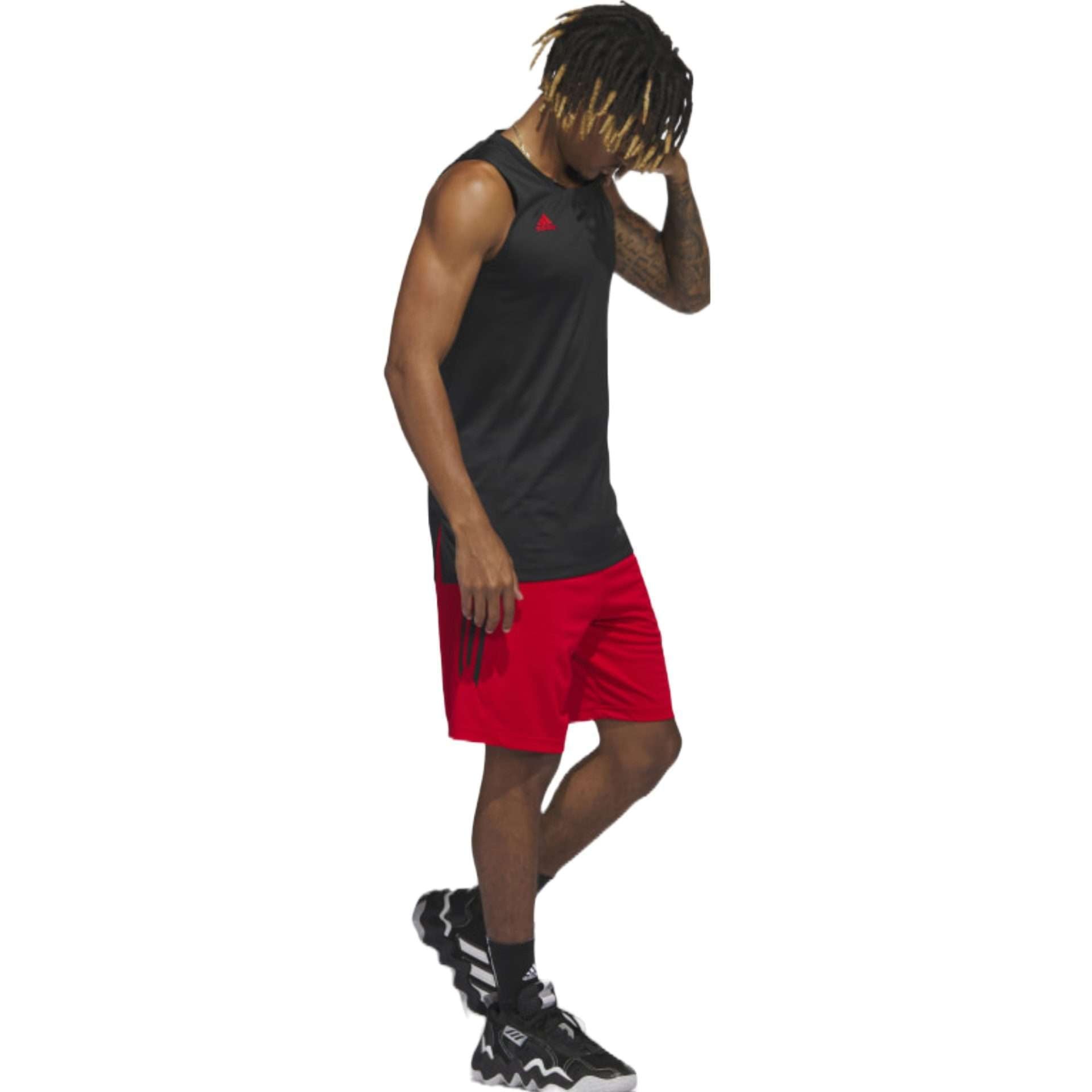 A pair of black Adidas Legends 3-Stripes basketball shorts with white stripes and a white Adidas logo