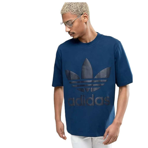 A man wearing adidas Men Originals Boxy Tee
