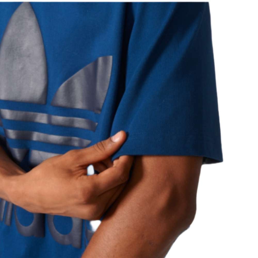 A man wearing adidas Men Originals Boxy Tee