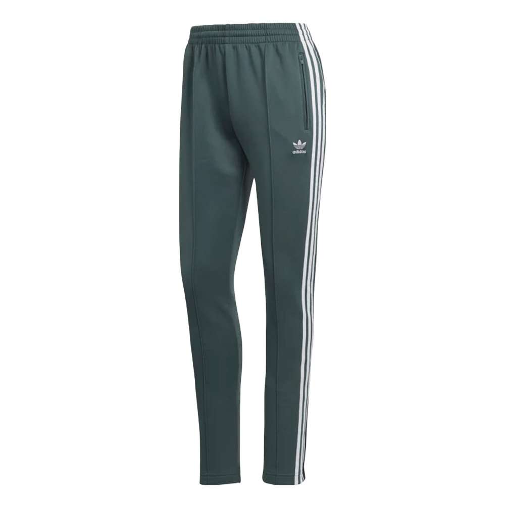A woman wearing the adidas Originals Women's Primeblue Superstar Track Pants