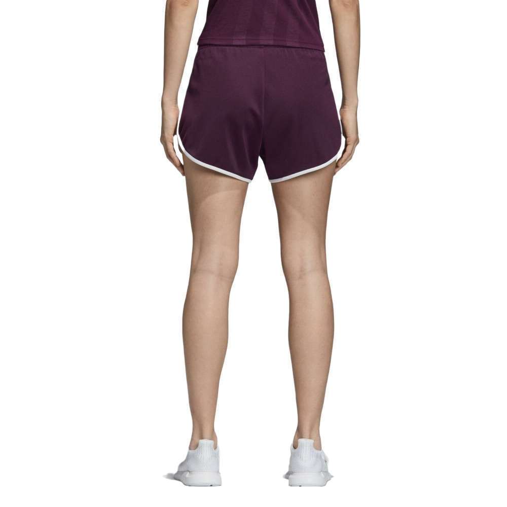 A woman wearing adidas Women's Originals AA-42 Shorts