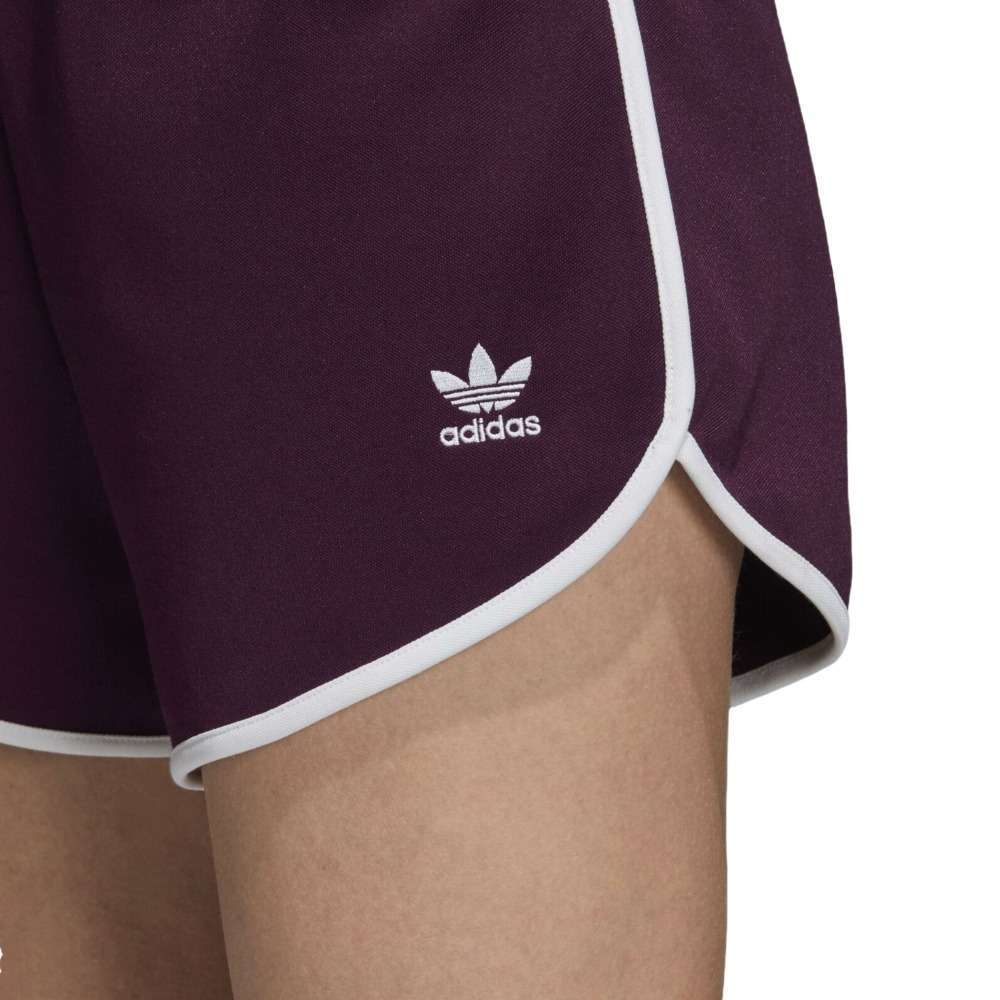 A woman wearing adidas Women's Originals AA-42 Shorts