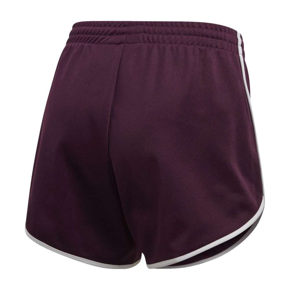 A woman wearing adidas Women's Originals AA-42 Shorts