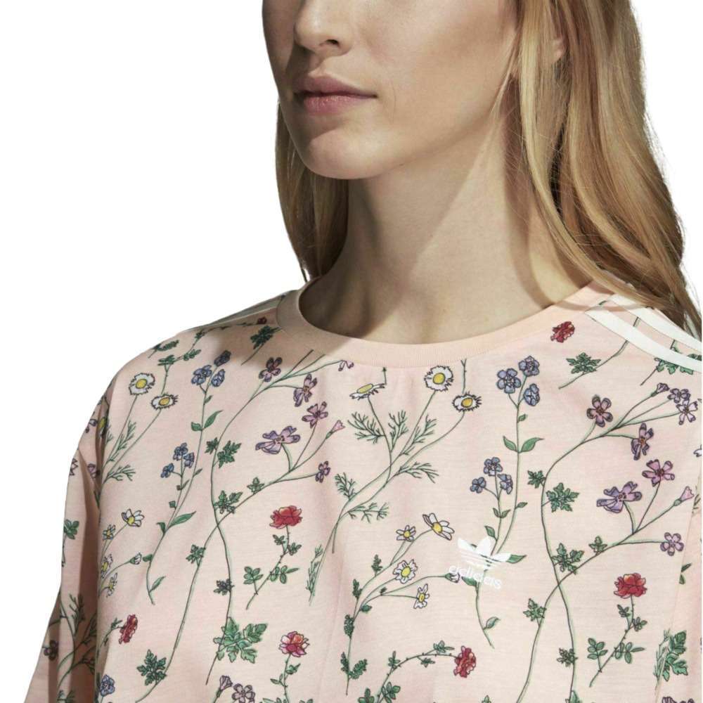 A woman wearing adidas Women Originals All Over Printed Tee