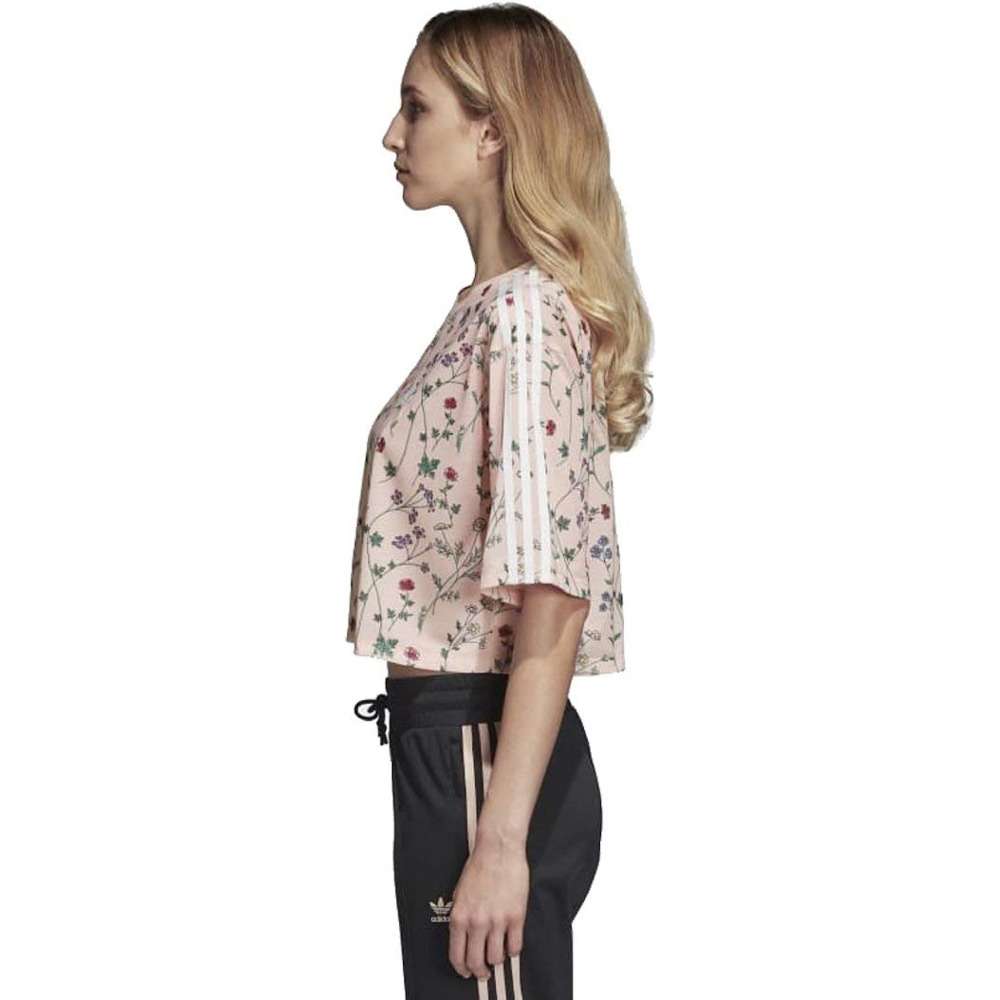 A woman wearing adidas Women Originals All Over Printed Tee