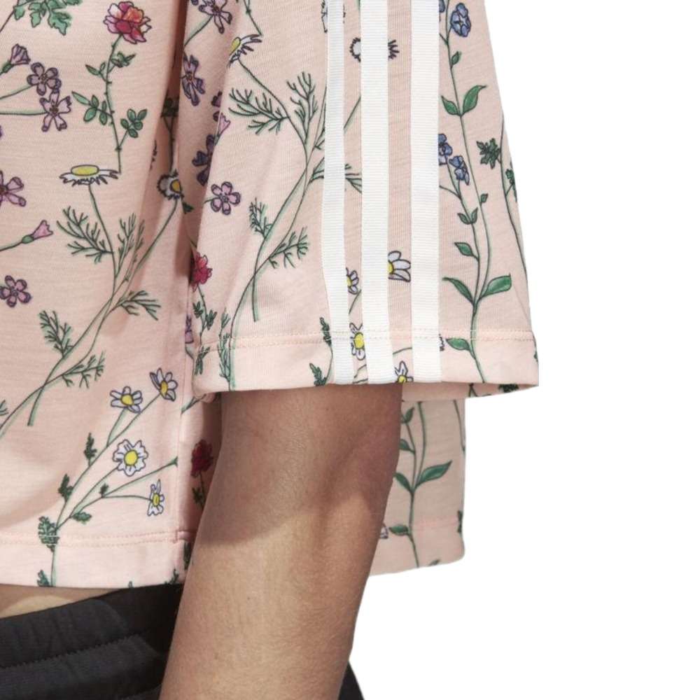 A woman wearing adidas Women Originals All Over Printed Tee