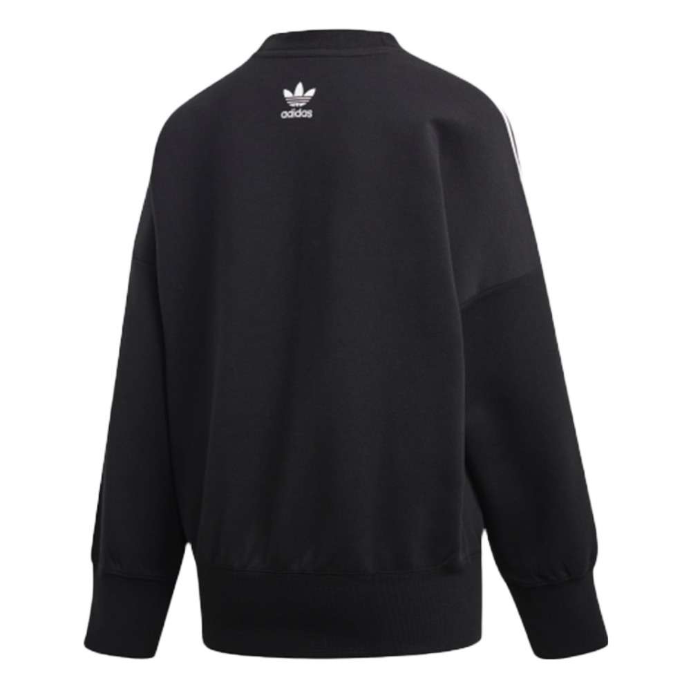 A woman wearing adidas Women's Originals Crewneck Sweatshirt