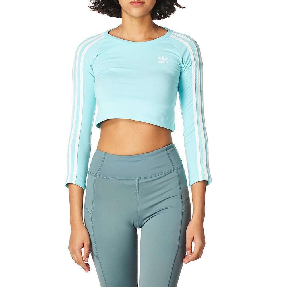 A cropped long sleeve t-shirt with adidas 3-Stripes design for girl.