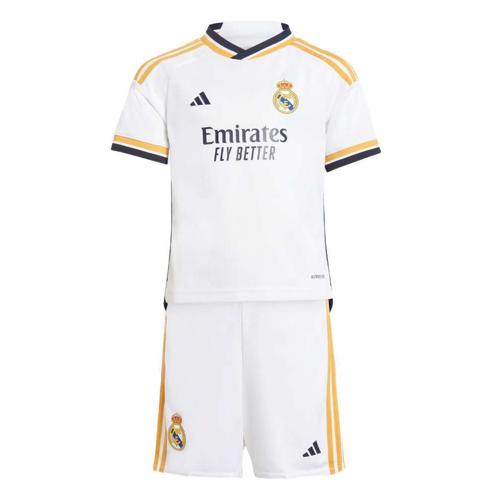 Kid wearing Real Madrid 23/24 Home Mini Kit
