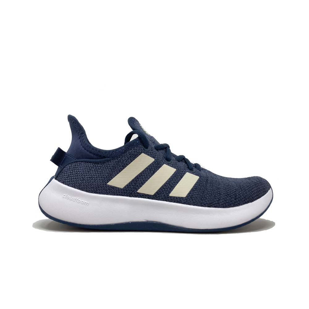 Experience ultimate comfort with adidas Women's Cloudfoam Pure Sportswear Sneakers, designed for style and support in every step.