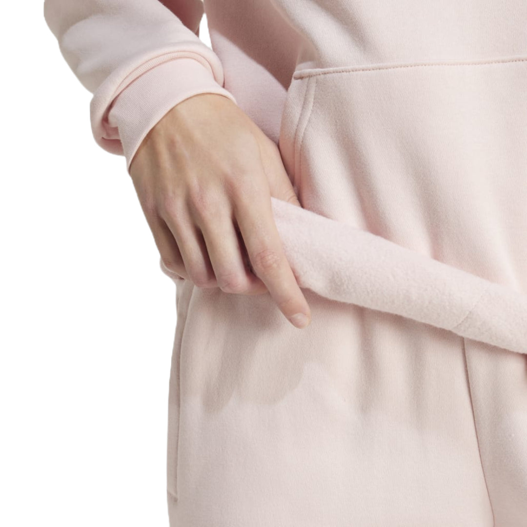 adidas Women's Essentials Small Logo Feel Cozy Hoodie in a relaxed fit, perfect for comfort and style.