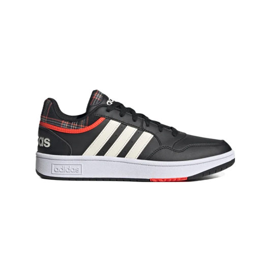 Adidas Men's Hoops 3.0 basketball shoes in black and white.