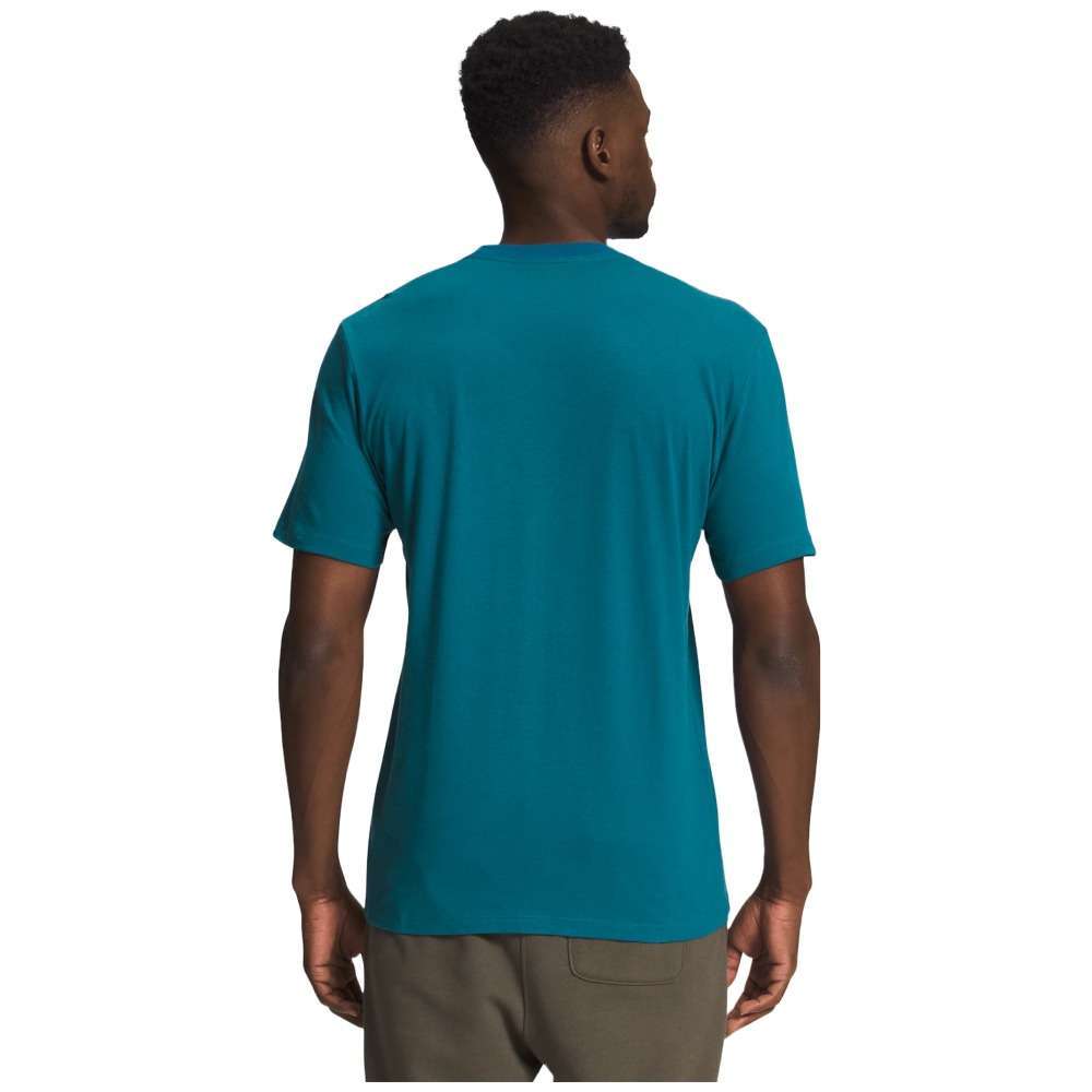 A man wearing The North Face Men's Short-Sleeve Jumbo Half Dome Tee.