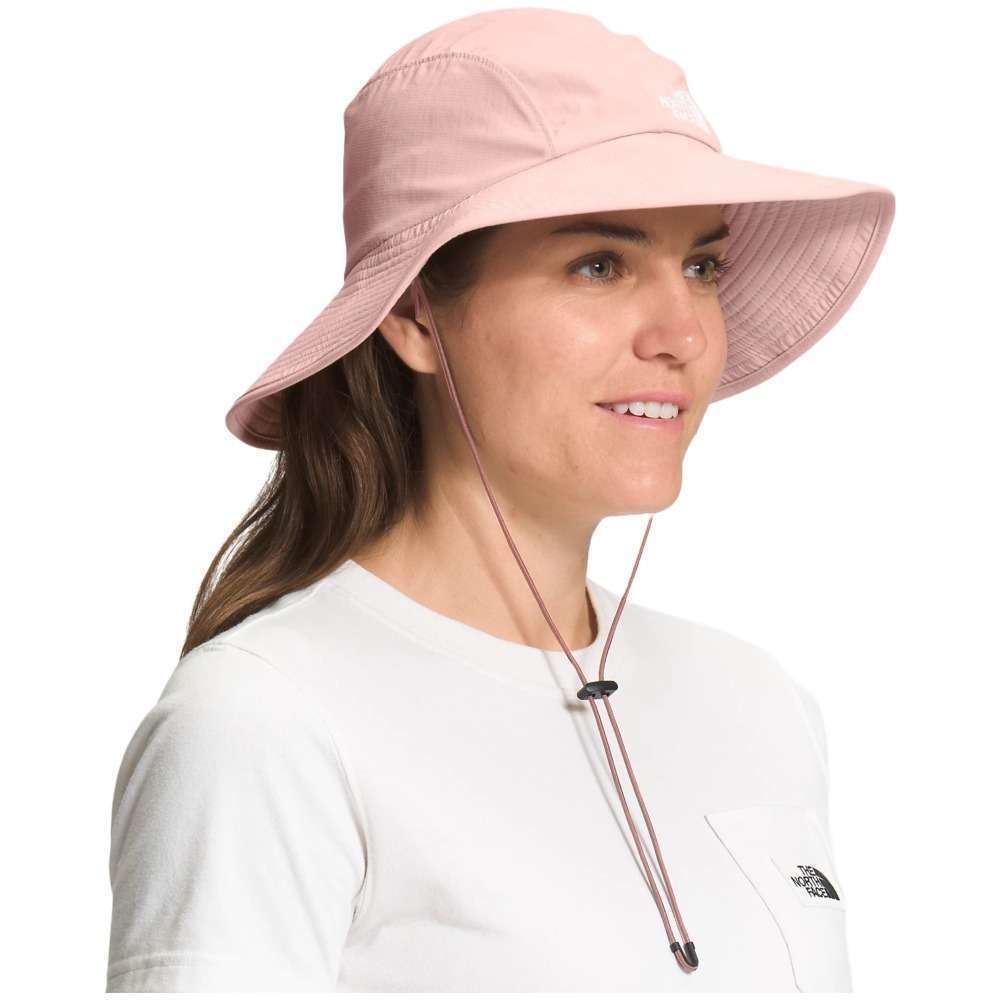 The North Face Women’s Horizon Breeze Brimmer hat in pink, worn by a woman