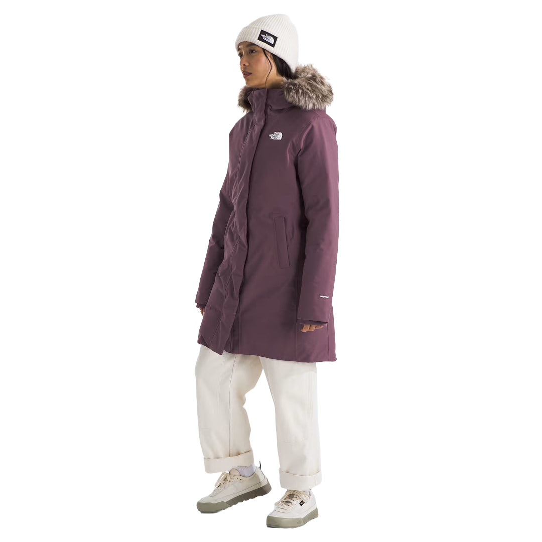 "The North Face Women's ARC Parka, lightweight waterproof jacket with a modern design, providing protection from rain and wind