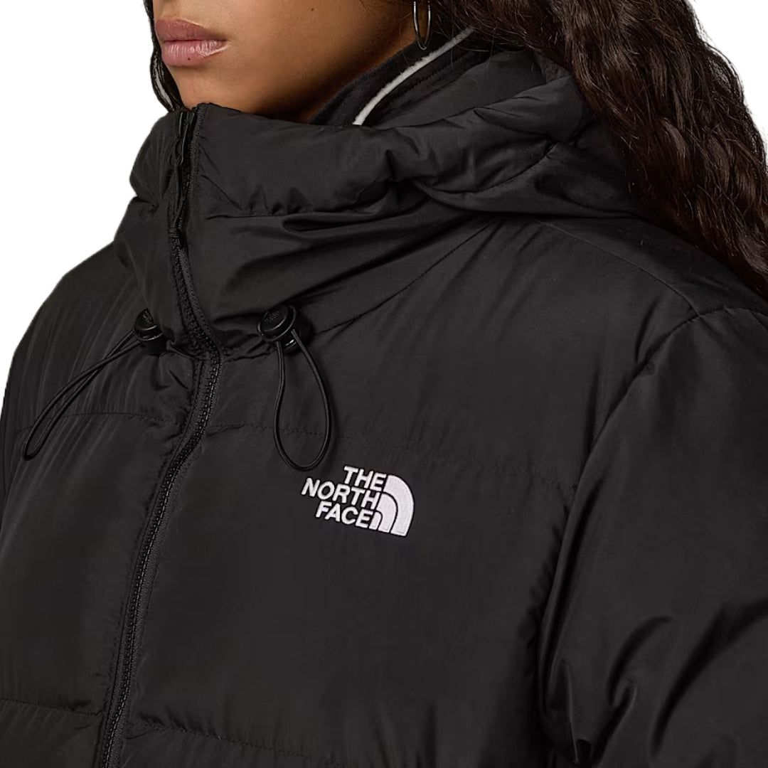 The North Face Women's Triple C Parka, long insulated winter coat with down fill, designed for warmth and style in cold weather.