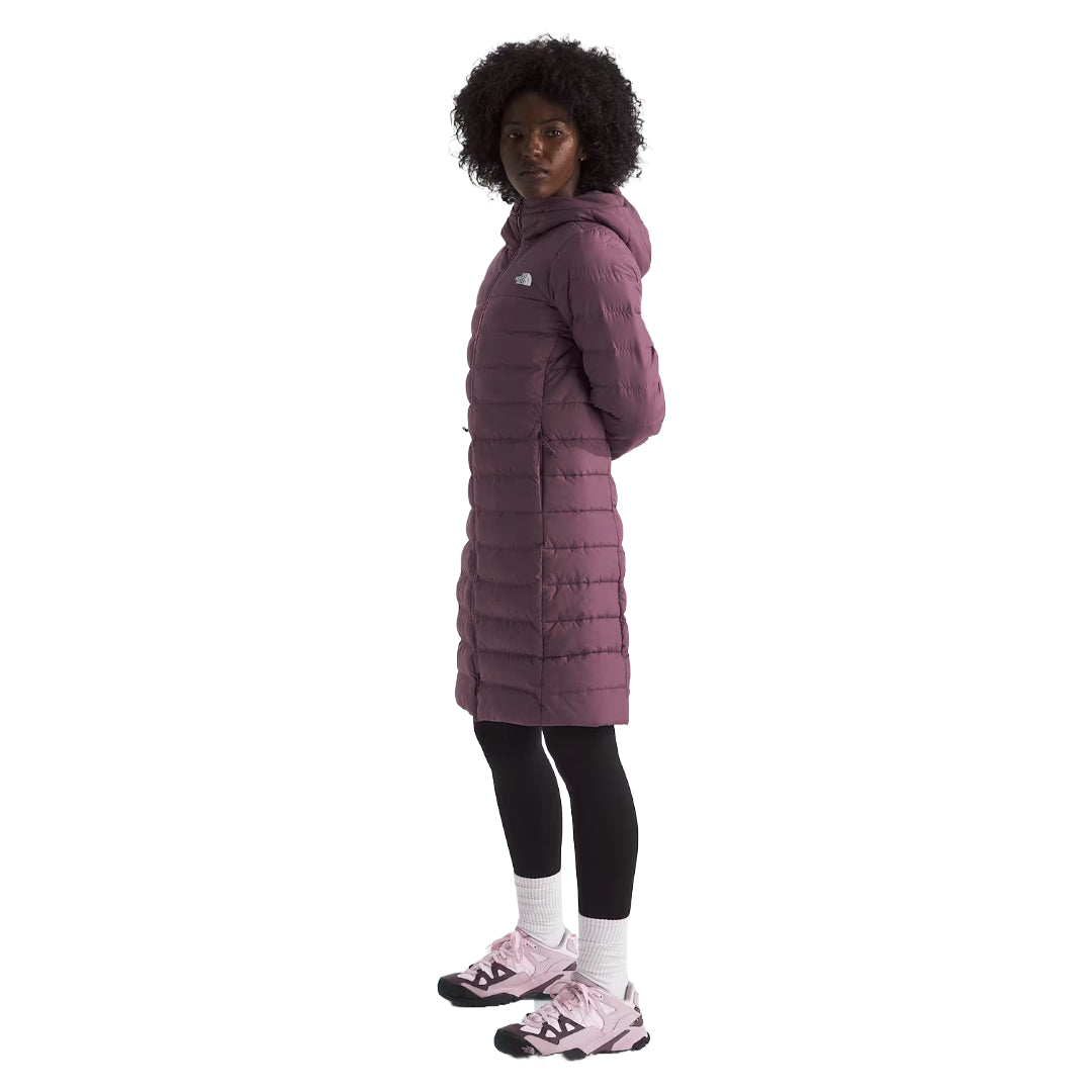 The North Face Women's Aconcagua Parka, insulated with down and synthetic fill, offering lightweight warmth and water-repellent protection