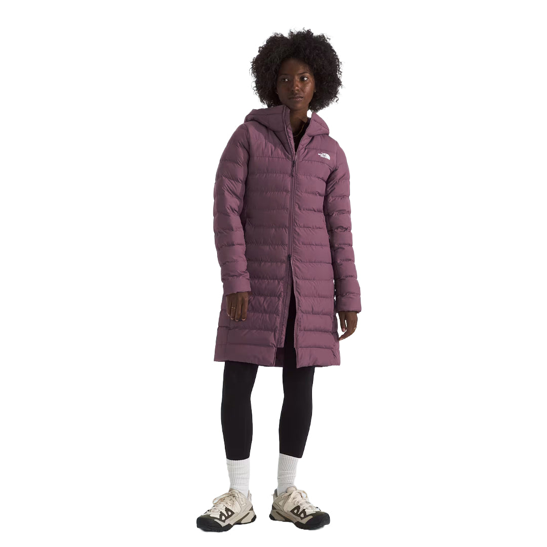 The North Face Women's Aconcagua Parka, insulated with down and synthetic fill, offering lightweight warmth and water-repellent protection