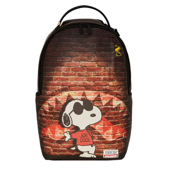 Backpack featuring Snoopy as “Joe Cool” in vibrant artwork, with gold zippers, side pockets, and a sleek, structured design