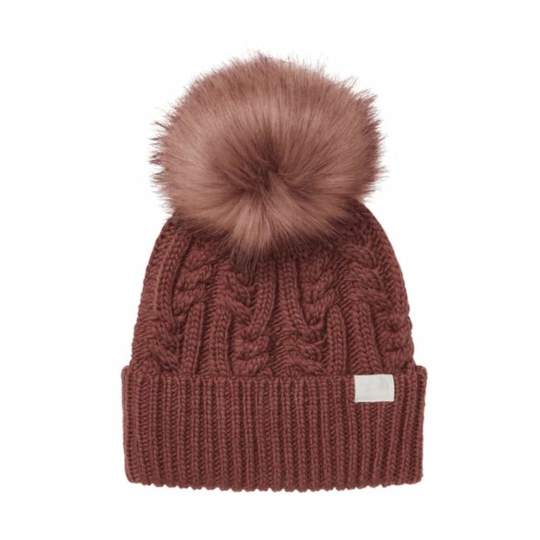 The North Face Women’s Oh Mega Fur Pom Beanie featuring soft knit fabric, fold-over cuff, and plush faux-fur pom on top for cozy winter style.