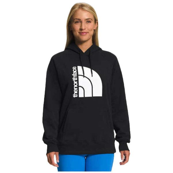 A close-up of the North Face Women's Half Dome Pullover Hoodie in classic black, showcasing the iconic logo and comfortable design.