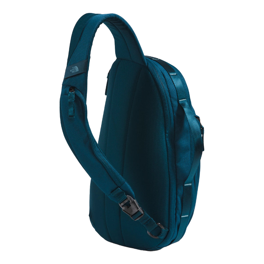 The North Face Isabella Sling Bag in black, featuring a compact design with multiple compartments and an adjustable strap.