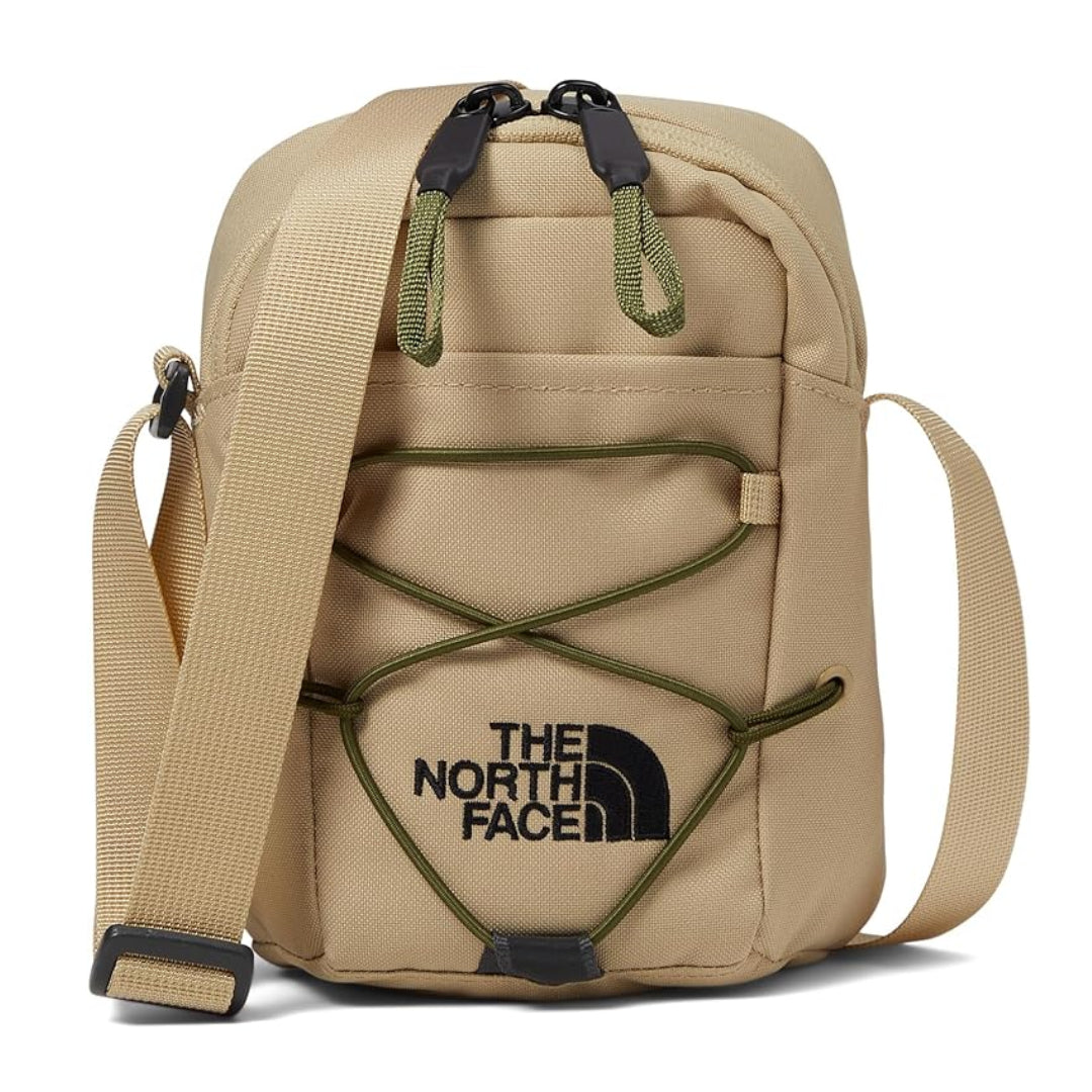 The North Face Jester Crossbody in black, featuring a compact design with multiple compartments and an adjustable strap.