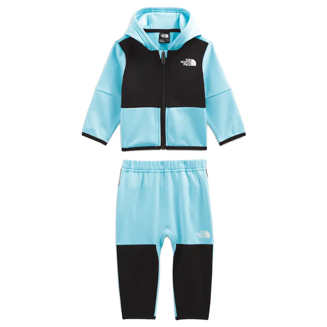 The North Face Baby Winter Warm Set – a cozy, insulated outfit designed to keep babies warm and comfortable in cold weather.