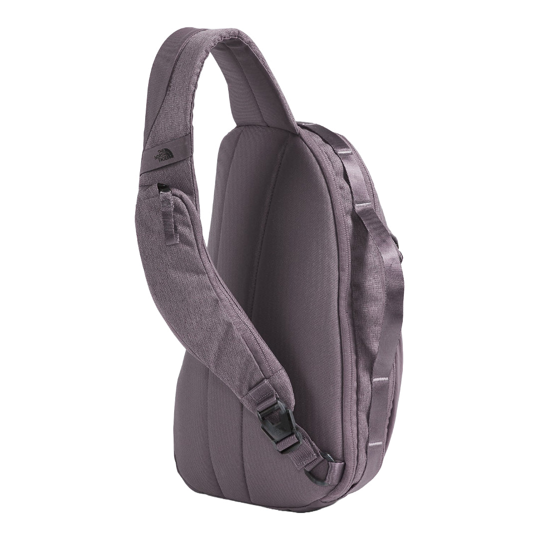 The North Face Isabella Sling Bag in black, featuring a compact design with multiple compartments and an adjustable strap.