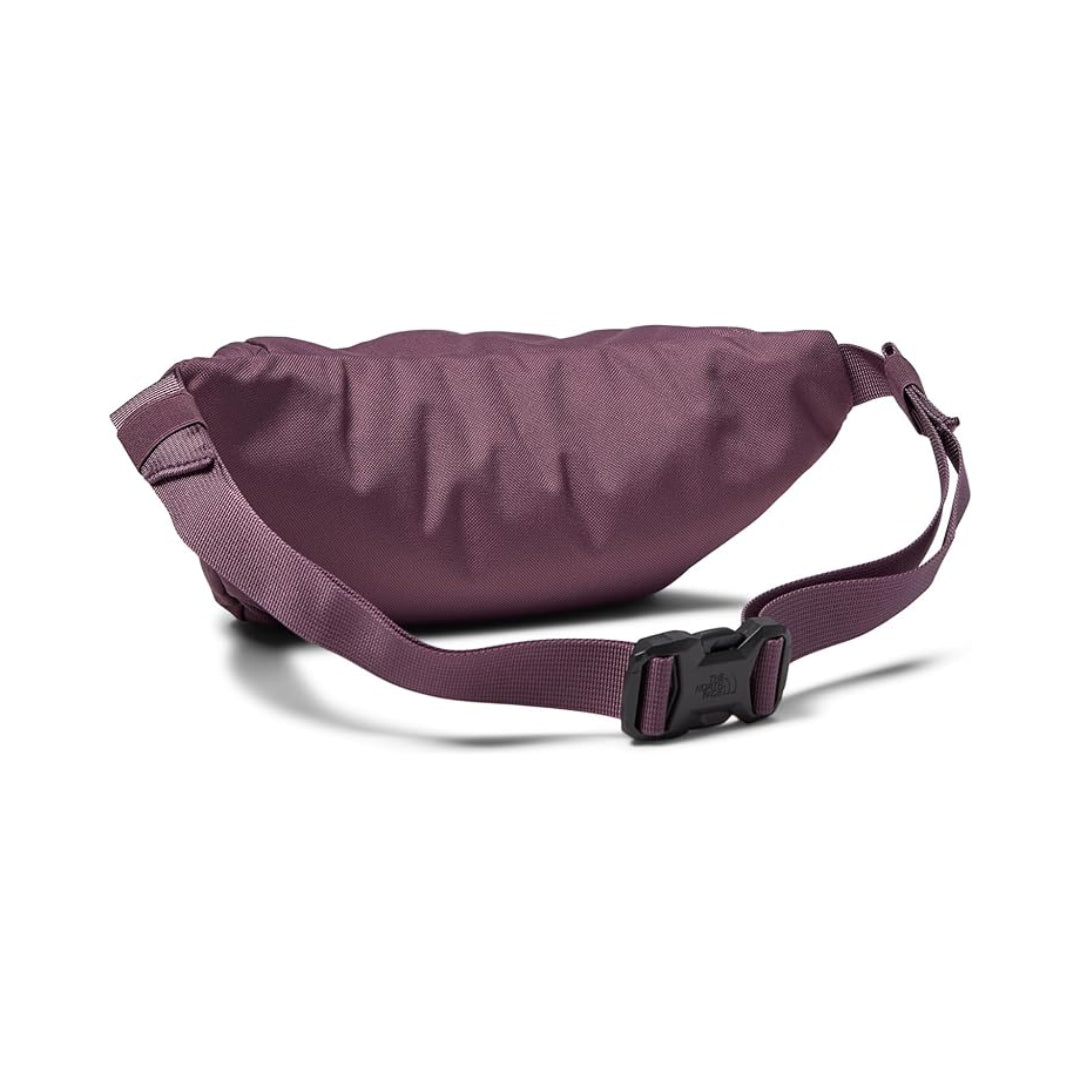 The North Face Jester Lumbar Pack in black, featuring a compact design with multiple compartments and an adjustable waist strap.