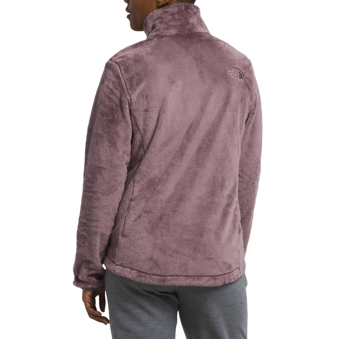 Embrace winter warmth in The North Face Women's Osito Jacket, a plush fleece layer perfect for chilly days and outdoor adventures.