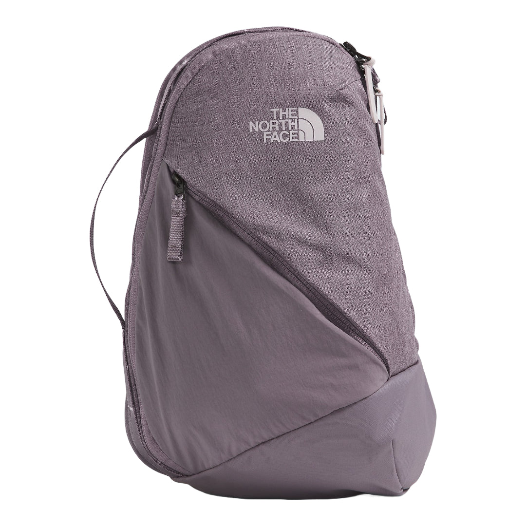 The North Face Isabella Sling Bag in black, featuring a compact design with multiple compartments and an adjustable strap.