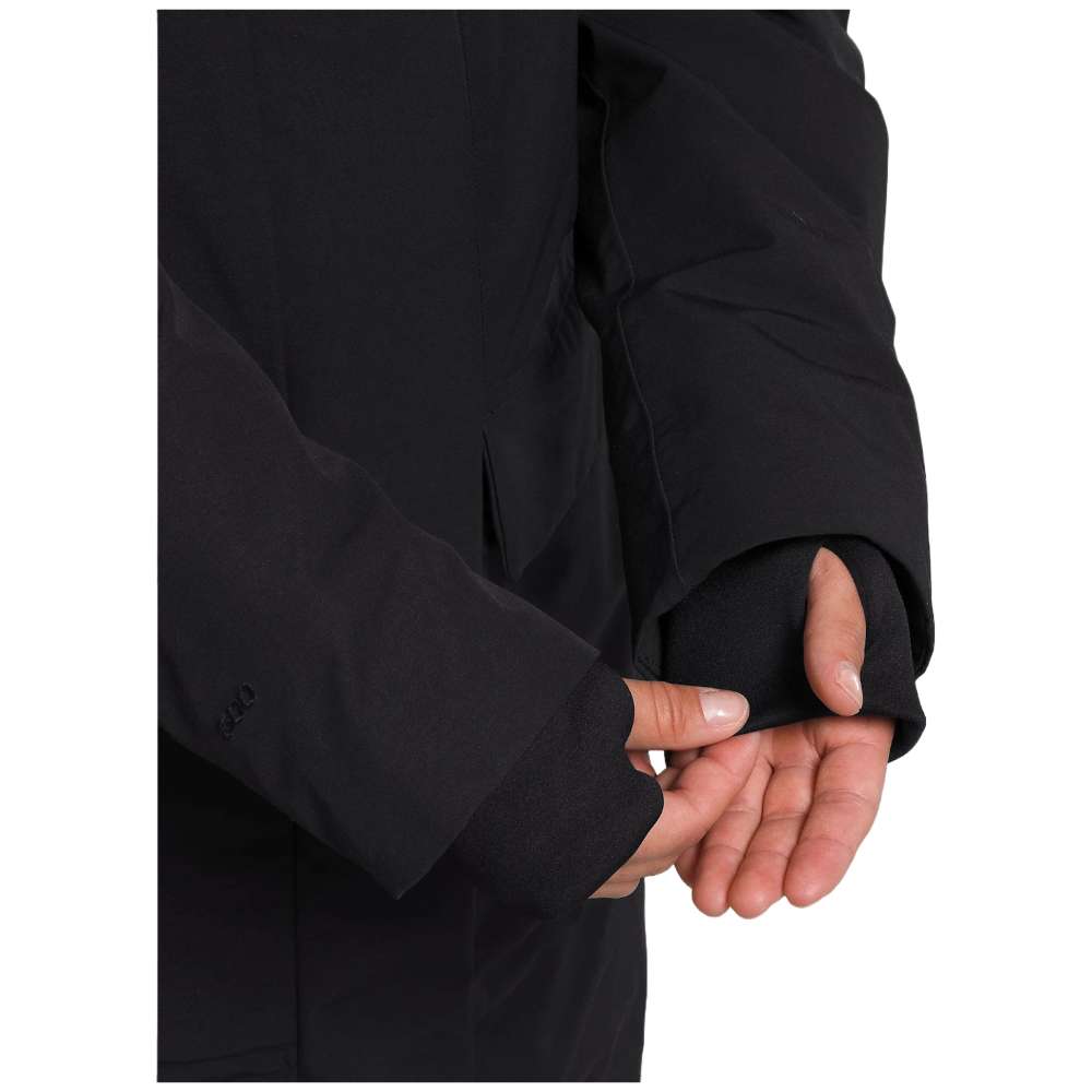 A woman wearing the North Face Women’s Arctic Parka Premium in sleek black