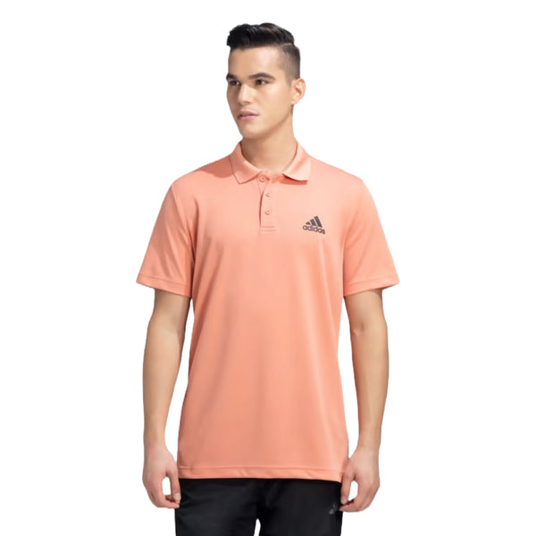 Sleek adidas Men's D2M Polo in wonder clay for versatile athletic style, perfect for workouts and casual wear.