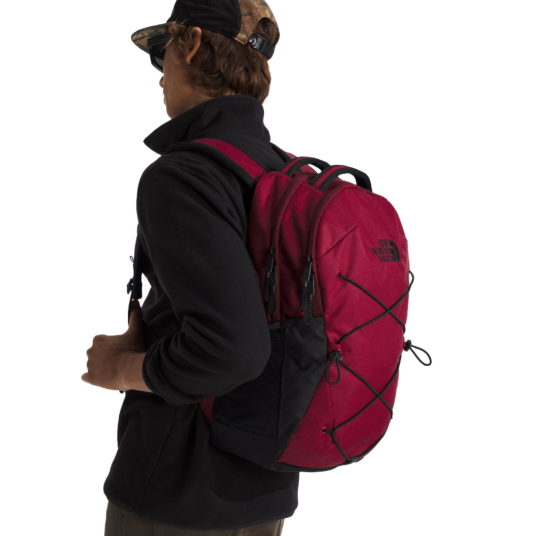 The North Face Jester Backpack in black, featuring a spacious design with multiple compartments and adjustable shoulder straps.