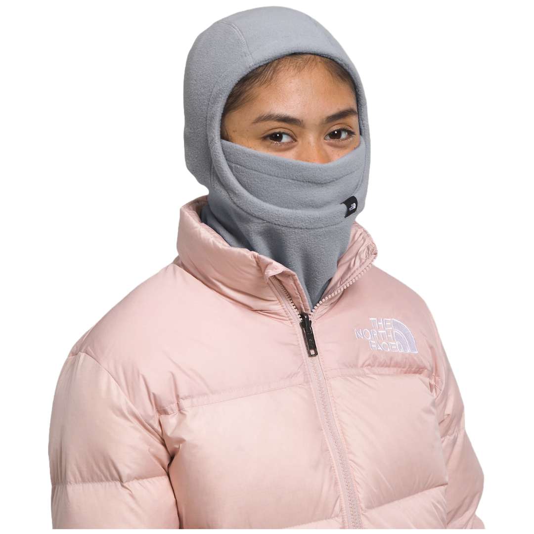 A close-up view of a North Face Kids Glacier Balaclava in vibrant colors, designed to keep children warm and protected in cold weather.