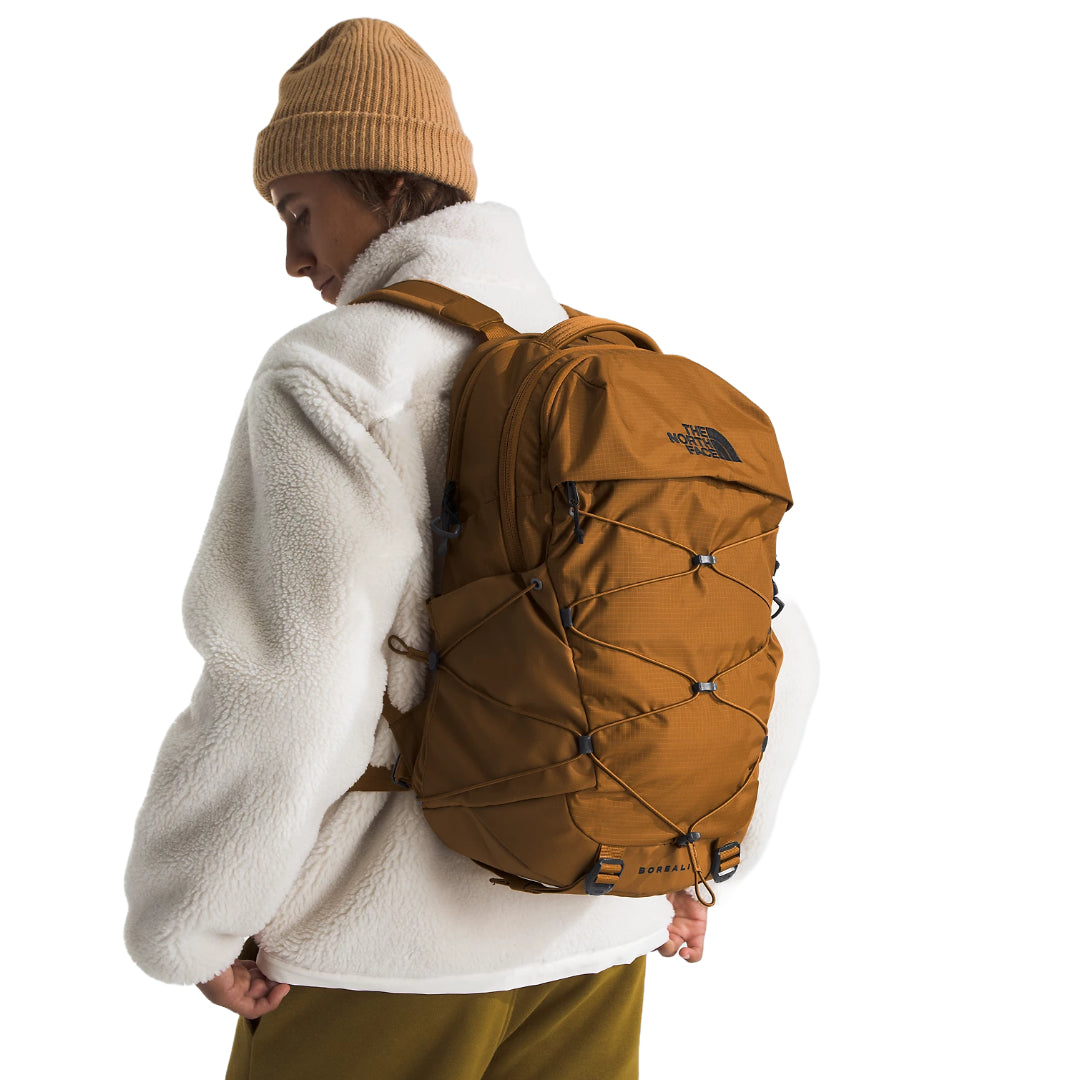 The North Face Borealis Backpack in black, featuring a versatile design, spacious compartments, and comfortable shoulder straps.