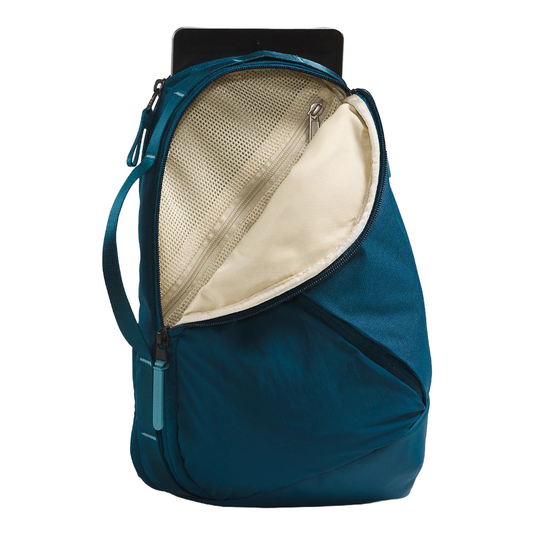 The North Face Isabella Sling Bag in black, featuring a compact design with multiple compartments and an adjustable strap.
