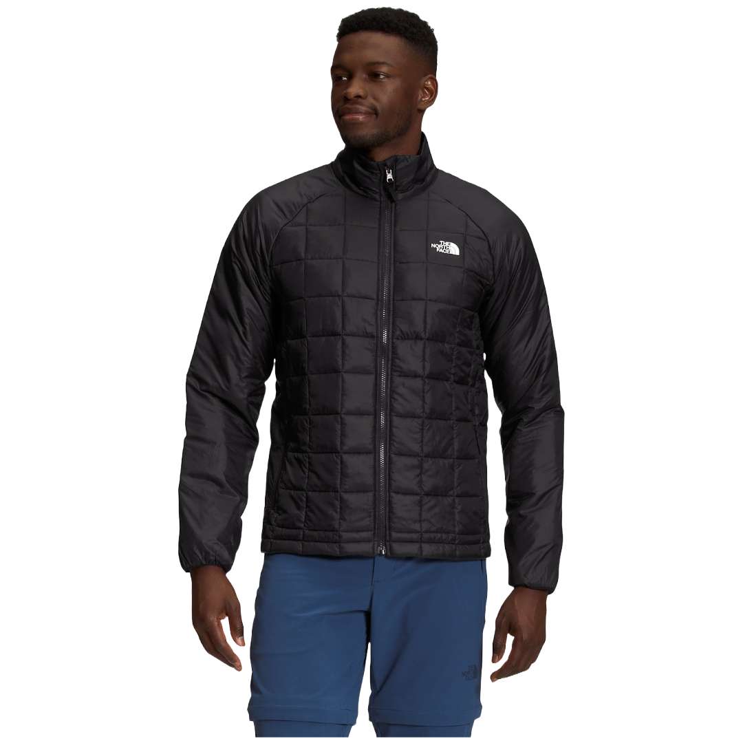 A man wearing The North Face Men’s ThermoBall™ Eco Triclimate® Jacket in TNF Black.