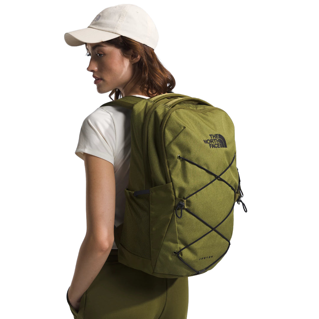The North Face Women's Jester Backpack in black, featuring a women-specific design, spacious compartments, and adjustable shoulder straps.