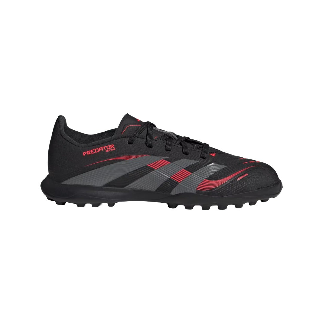 adidas Kids' League Predator Turf Sneakers in black with bold red accents, featuring textured uppers and turf-ready rubber soles for young soccer players.