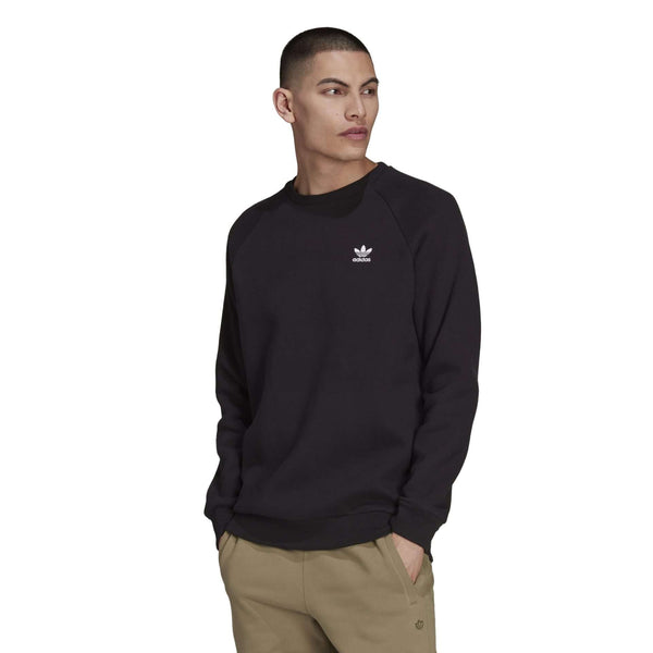 adidas Originals Men’s Essential Crewneck Sweatshirt in black with Trefoil logo on chest and ribbed cuffs and hem.