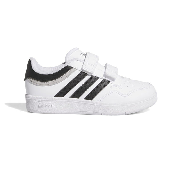 adidas Unisex-Child Hoops 4.0 Basketball Sneaker in white with black 3-Stripes and mid-top design for ankle support.