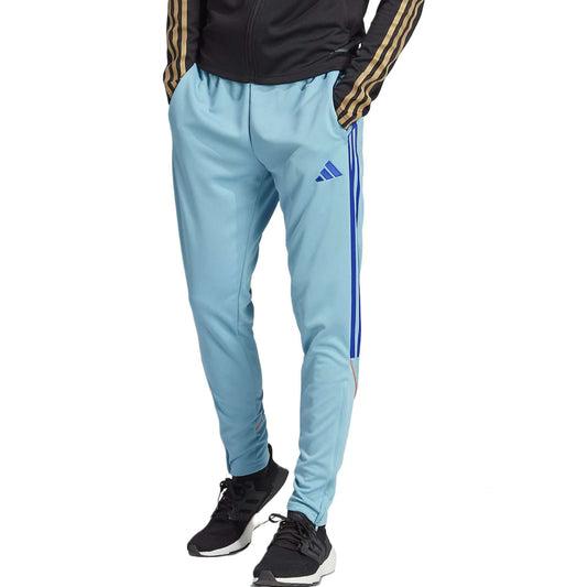 Adidas Men's Tiro23 Track Pants in Preloved Blue/Lucid Blue with white stripes down the sides and Adidas logo on the left thigh