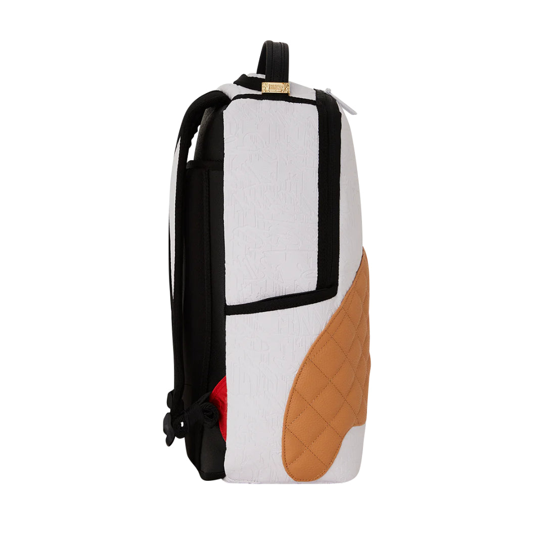 Sprayground Yokohama DLXSV Backpack featuring a bold, artistic design with premium materials and versatile storage options.