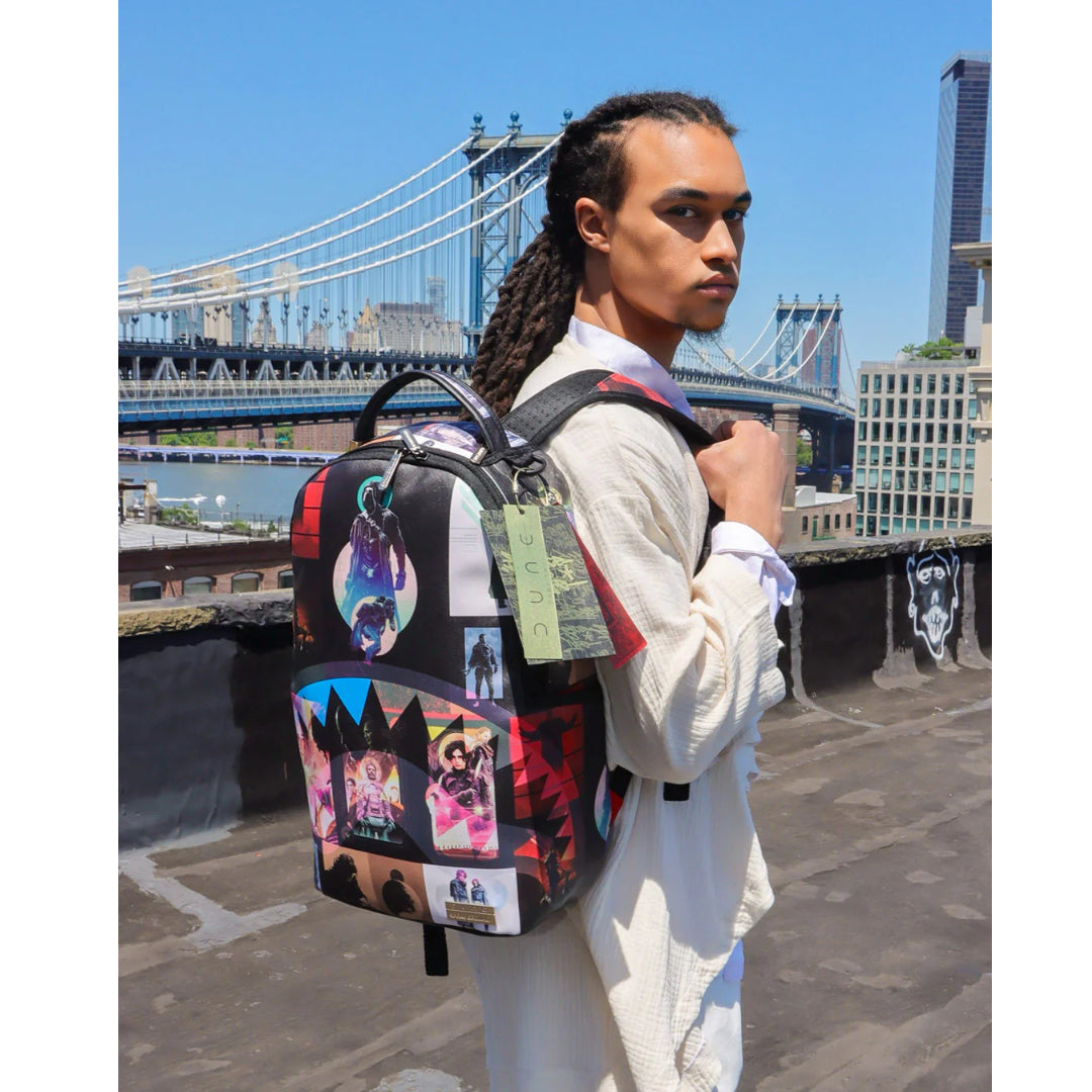Sprayground Dune Collage Backpack featuring a vibrant, eclectic mix of patterns and designs inspired by desert landscapes.