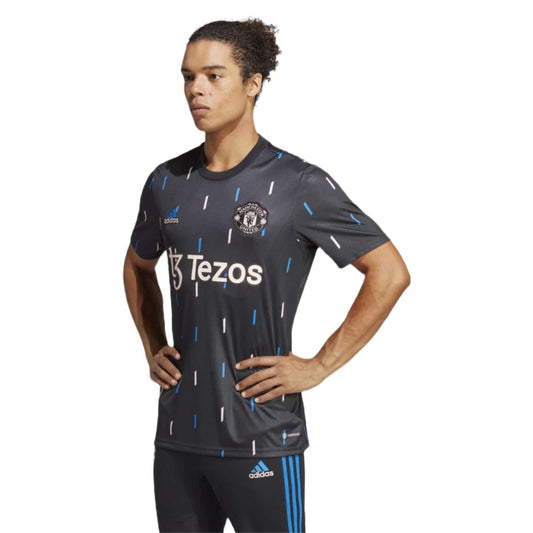 Manchester United Pre-Match Jersey. Bold and vibrant jersey featuring the official Manchester United team colors and logo