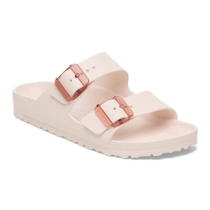Minimalist Birkenstock Arizona EVA sandals with tonal stealth buckles, lightweight waterproof two-strap design, worn casually for beach or everyday comfort